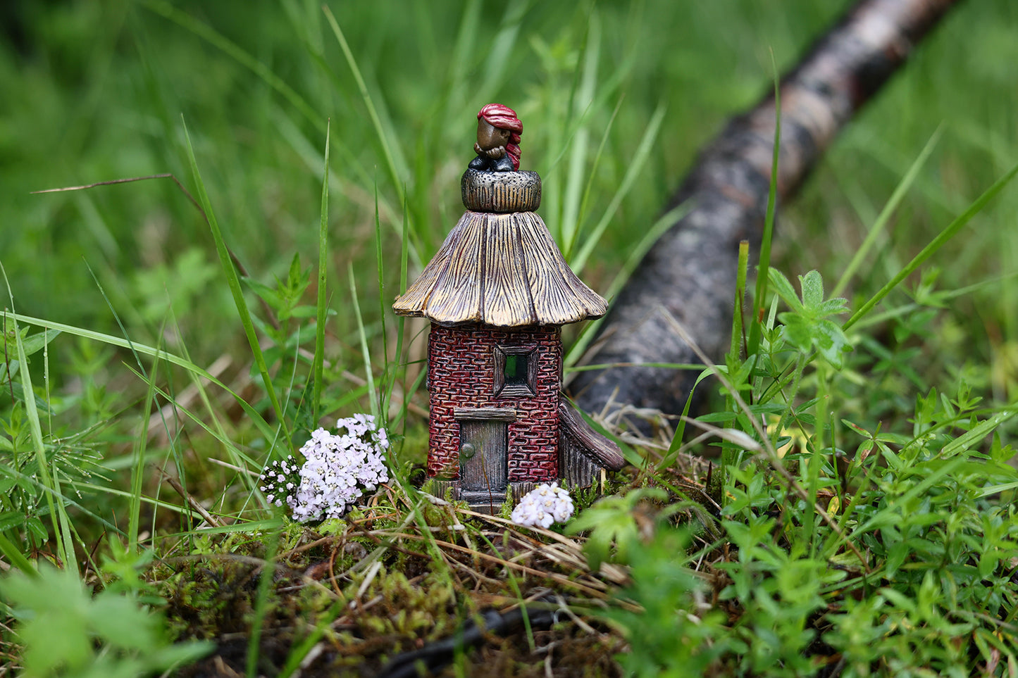 Bottle house with a redhead