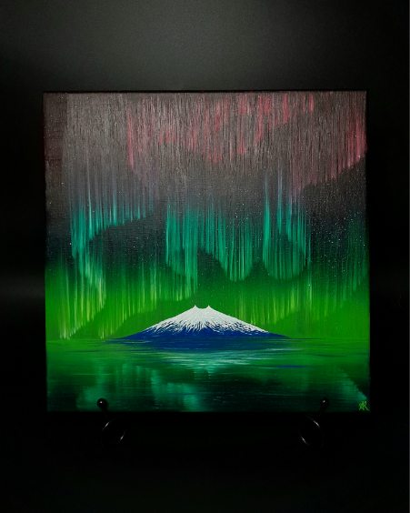 Artistic depiction of a mountain with green and pink northern lights on a dark background