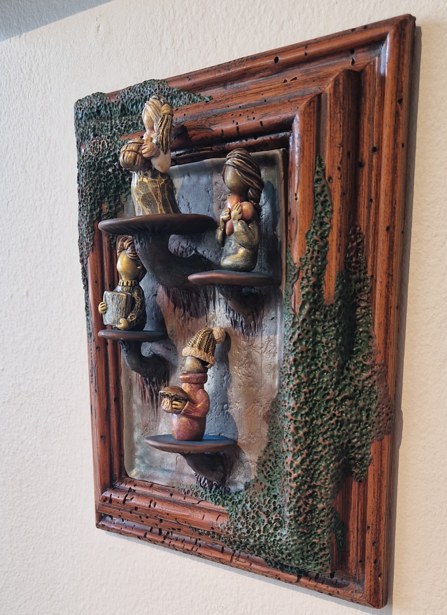 Mossy frame with mushroom shelves by Jódís Eva